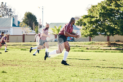 Image of Rugby, sports and fitness with a team on a field together for a game or match in preparation of a competition. Training, health and teamwork with a group of men outdoor on grass for club practice