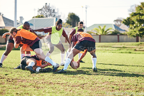 Image of Rugby, fitness and training with a team on a field together for a game or match in preparation of a competition. Sports, health and teamwork with a group of men outdoor on grass for club practice