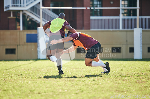 Image of Rugby, sports and tackle with a team on a field together for a game or match in preparation of a competition. Exercise, health and teamwork with a group of men outdoor on grass for club training