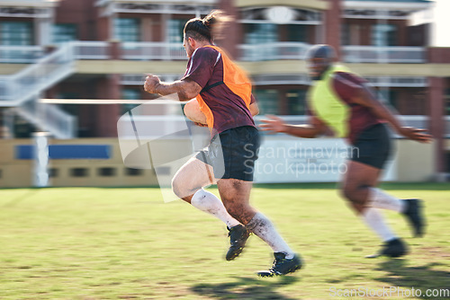 Image of Rugby, sports and motion blur with a team running on a field together for a game or match in preparation of competition. Fitness, health or teamwork with a group of men training on grass for practice