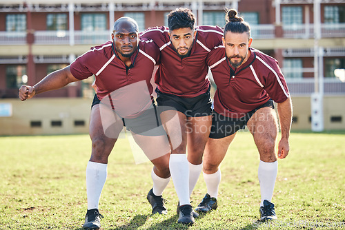 Image of Portrait, fitness and a rugby team training together for a scrum in preparation of a game or competition. Sports, exercise and teamwork with a male athlete group at an outdoor stadium for practice