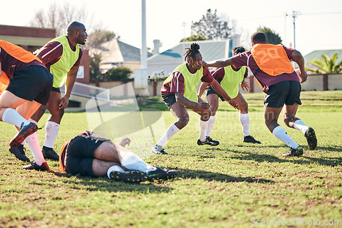 Image of Rugby, sports and running with a team on a field together for a game or match in preparation of a competition. Fitness, training and teamwork with a group of men outdoor on grass for club practice