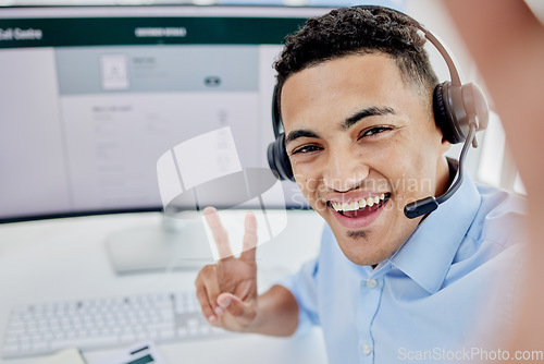 Image of Man, call center selfie and happy communication, customer service and e commerce on computer screen and peace sign. Consultant portrait, agent face or business person for profile picture on desktop