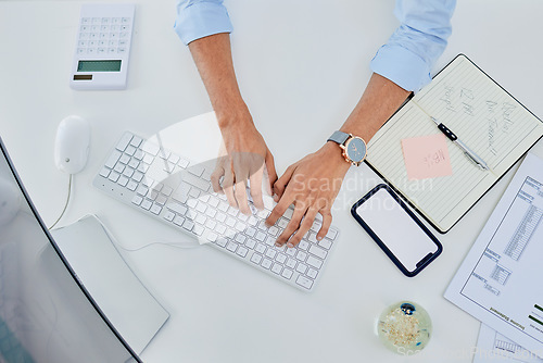 Image of Person, hands and keyboard for planning finance, accounting and taxes management with phone screen mockup. Business worker or accountant typing on computer with calculator, notebook and mobile above