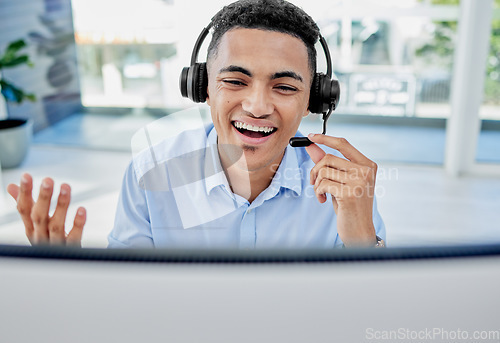 Image of Telemarketing, customer service and man agent in the office doing an online consultation. Contact us, crm and professional young male call center consultant working with a headset in the workplace.