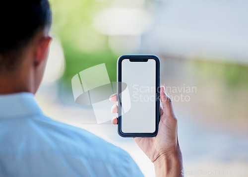 Image of Phone, screen and mockup in the hand of a person for website marketing on advertising on space. Mobile, logo or branding on a display for contact, communication or networking in ecommerce or sales