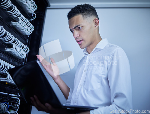 Image of Laptop problem, server room technician and man react to software glitch, system fail or online database error. Cybersecurity risk, programmer and male IT specialist stress over datacenter virus