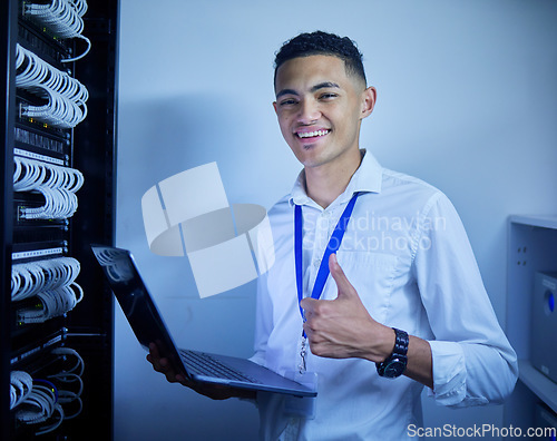 Image of Man, thumbs up and server room on computer in cybersecurity, IT cables and hardware or data safety solution. Electrician, engineering portrait and laptop with like or good job in software programming