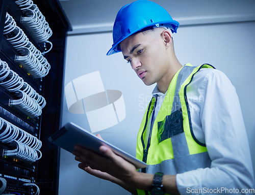 Image of Man, engineering and server room, tablet and data center management, power upgrade or cybersecurity check. Young, electrician person on digital tech for programming, electricity or cables maintenance