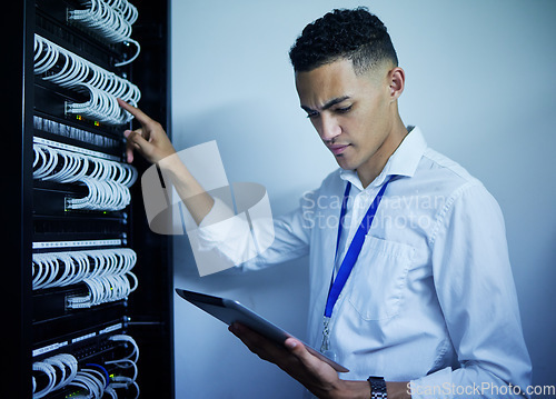 Image of Man, engineering and tablet in server room or data center inspection, system solution or cybersecurity management. Electrician person on digital technology by power cables, electricity or programming