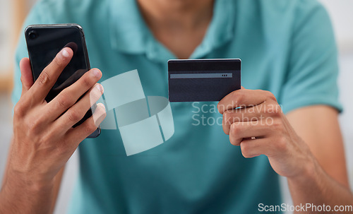 Image of Hands, credit card and smartphone, man is online shopping and fintech with payment and discount on store website. Male customer, e commerce and internet banking, mobile app and finance with account