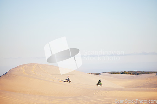 Image of Desert, sports people and motorbike race, rally or off road marathon travel, journey and driving on competition adventure. Motorcycle speed, extreme challenge or fast racer training on sand dunes