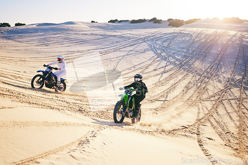 Image of Motorcycle, desert dune and race for speed, competition or outdoor hill for performance, goal or off road. Motorbike athlete, trail or ramp in nature, sand or together for training in summer sunshine