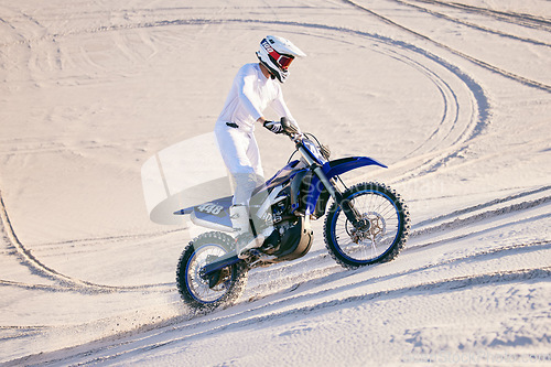 Image of Sand, desert or man with motorcycle for action, adventure and fitness with performance. Adrenaline, extreme sports and male person on motorbike on dunes for training, exercise and race or challenge