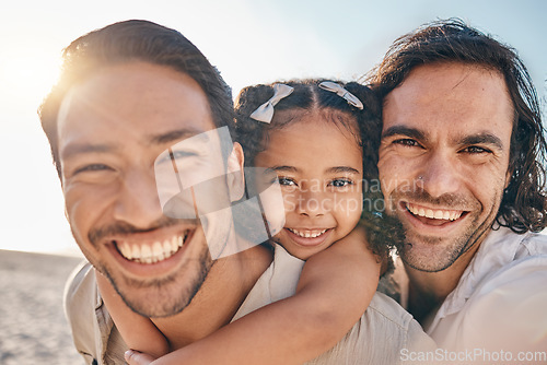 Image of Portrait of lgbt family on beach, men and child with smile in summer and happy island holiday together. Love, nature and sun, gay couple on tropical ocean vacation with young daughter on piggy back.