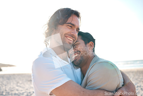 Image of Love, hug and gay couple on beach, smile and laugh on summer vacation together in Thailand. Sunshine, ocean and island, happy lgbt men embrace in nature for on fun holiday with pride, sea and sand.