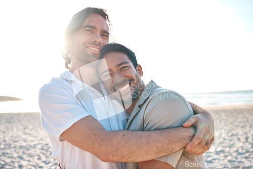 Image of Love, happiness and gay couple on beach, hug and laugh on summer vacation together in Thailand. Sunshine, ocean and smile, lgbt couple embrace in nature for fun holiday with pride, sea and sand.