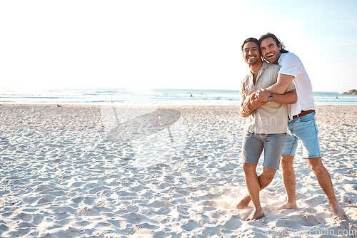 Image of Love, hug and gay men on beach, mockup and laugh on summer vacation together in Thailand. Sunshine, ocean and romance, happy lgbt couple embrace in nature for fun holiday with pride, sea and sand.