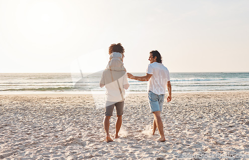 Image of Beach, LGBT and walking kid, family and enjoy freedom together on travel vacation, holiday or nature freedom. Love, back and gay couple, people or parents bonding with adoption child on shoulder