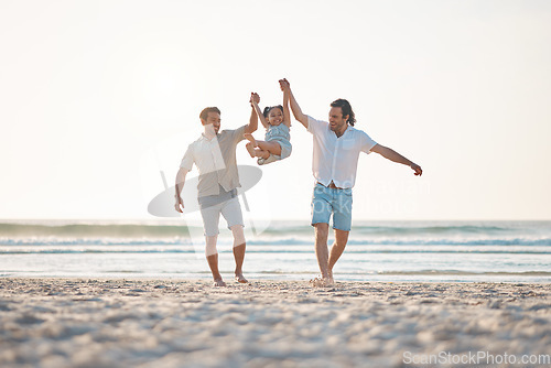 Image of Gay couple, swing and holding hands with family at beach for seaside holiday, support and travel. Summer, vacation and love with men and child in nature for lgbtq, happiness and bonding together