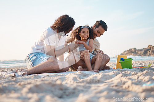 Image of Happy, playing and a lgbt family at the beach for summer relax, love and travel together. Smile, vacation and gay men with a girl kid at the ocean for a holiday, fun and laughing on the sand