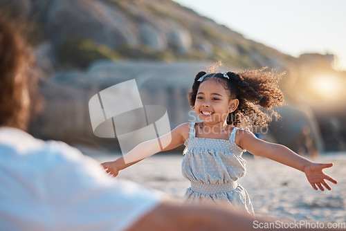 Image of Child, running or father hug by ocean to play a game in Rio de Janeiro in Brazil with support, care or love. Smile, parent or happy kid at sea to enjoy family bonding together in nature on beach sand