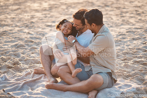 Image of Gay couple on beach, playing with child and family on holiday picnic together with games and laughing. Love, happiness and sun, lgbt parents on tropical ocean vacation with daughter on island sand.