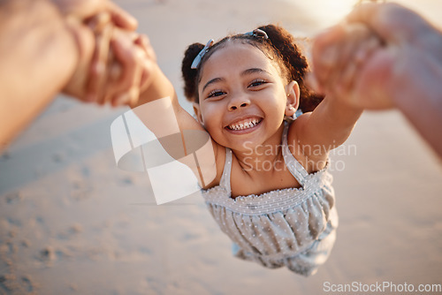 Image of Girl child, swing and pov at beach, portrait and smile for game, holding hands or speed in summer. Young female kid, parent and spin in air, sand or happy for family bonding, love or care in sunshine