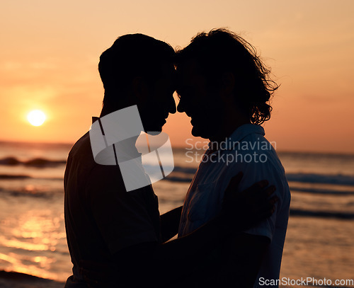 Image of Silhouette, sunset and gay men on beach, love and shadow on summer island vacation together in Thailand. Sunshine, ocean and romance, lgbt couple in nature and fun holiday with pride, sea and waves.