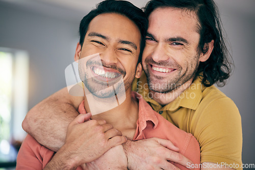 Image of Happy, portrait and gay couple hug, excited and sweet in their home with freedom on the weekend together. LGBT, love and face of man embrace boyfriend in a living room with care, romance and pride