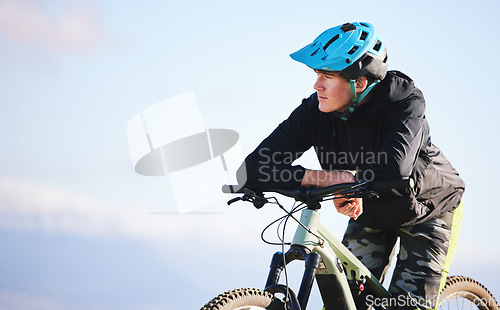 Image of Thinking, fitness and a man cycling in nature for exercise, cardio or training idea with mockup. Health, space and a male cyclist with a bike for travel, outdoor sports or a workout for an athlete