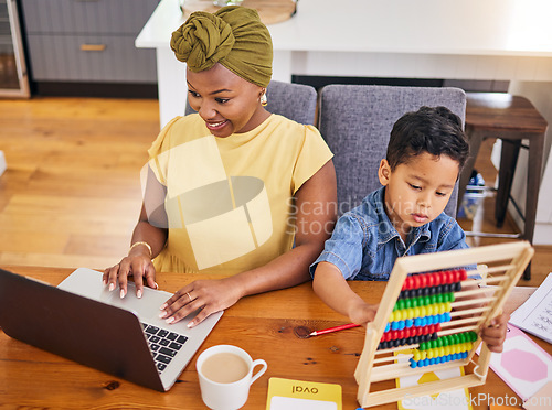 Image of Remote work, mother and child with math at a table for education, learning and an email. Diversity, family and an African mom with a kid, homework and a laptop for business on the internet from home
