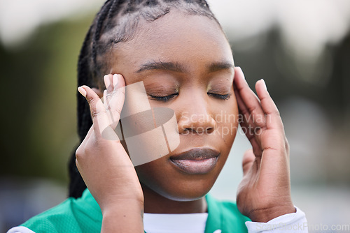 Image of Sports, headache and face of black woman outdoor with stress, anxiety or burnout on blurred background. Training, migraine and African lady athlete with temple massage for vertigo, brain fog or ache