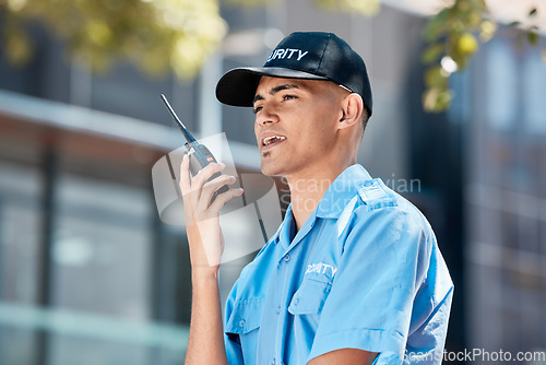 Image of Walkie talkie, security guard and man in city in communication, discussion and conversation. Safety, protection and officer on radio to chat on tech in police law enforcement service in urban outdoor