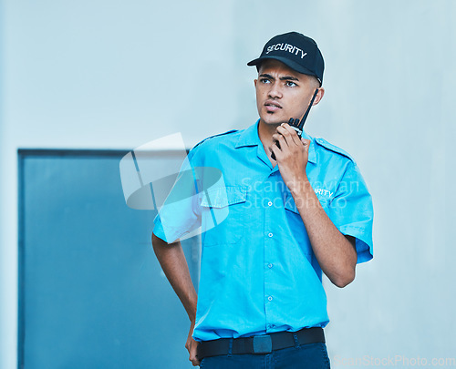 Image of Walkie talkie, security guard and man in office in communication, surveillance and thinking. Safety, protection and serious bodyguard on radio to chat on tech in police investigation and inspection