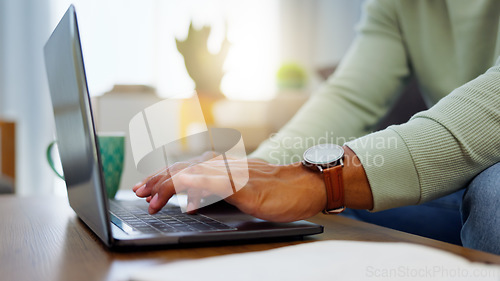 Image of Closeup, work from home and hands with a laptop, typing and connection with network, smartphone and keyboard. Person, entrepreneur or freelancer with pc, deadline and search internet for website info