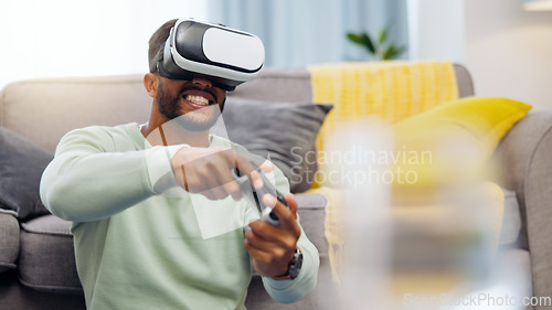 Image of Vr, gaming Indian man in virtual reality in home on sofa in living room, laughing and having fun. 3d metaverse, esports gamer and happy young male playing futuristic games with controller