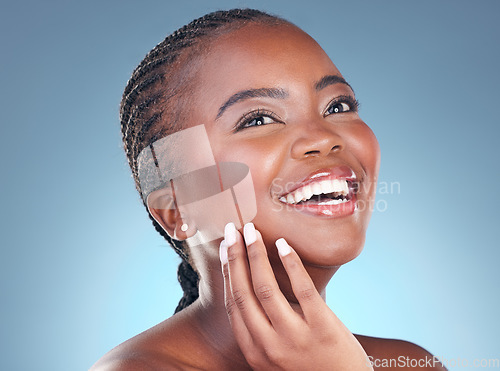 Image of Skincare, beauty and face of black woman on blue background for wellness, health and spa. Salon aesthetic, dermatology and happy African person in studio with cosmetics, makeup and facial for glow