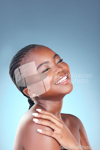 Image of Face of African woman for skincare, beauty and smile on blue background for wellness, health and spa. Salon aesthetic, dermatology and happy person in studio with cosmetics, makeup and facial glow