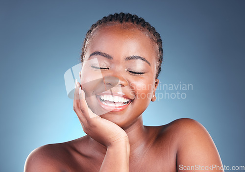 Image of Face of black woman for cosmetics, beauty and eyes closed on blue background for wellness, facial or spa. Salon aesthetic, dermatology and happy African person in studio for skincare, makeup and glow