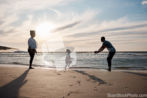 Image of Beach, sunset and family in nature with freedom, play or bond on travel, trip or vacation together. Ocean, games and excited girl child running to dad at sea happy, love or enjoy holiday with parents