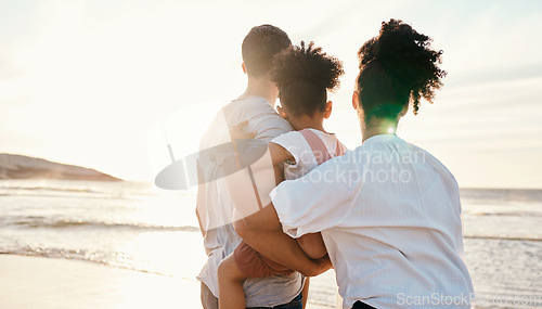 Image of Family, beach and watching sunset, travel and bonding, love with back view and together outdoor. Vacation, ocean and people in nature, man and woman with kid, sunshine and adventure with peace