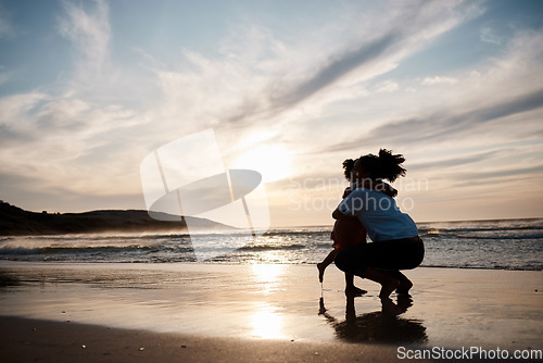 Image of Mother, child and hug at beach in silhouette with sunset, mockup and love on island holiday together. Embrace, mom and kid at ocean with sky, waves and space at water on tropical vacation with trust.