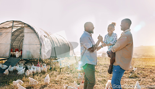 Image of Playful, gay couple and chicken with black family on farm for agriculture, environment and bonding. Relax, nature and love with men and child farmer on countryside field for eggs, care and animals