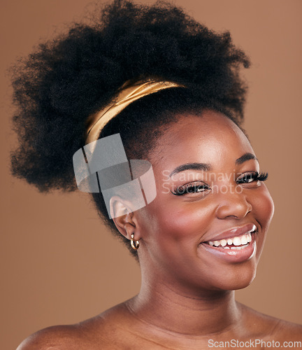 Image of Portrait, natural afro or happy black woman with hair care, self love or smile on a brown studio background. Hairstyle, healthy growth or African model with glow or beauty with aesthetic or wellness