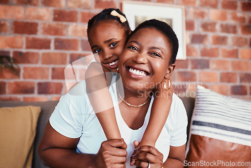 Image of Portrait of mom and kid on sofa with hug, bonding and relax in living room together. Love, mother and daughter on couch in apartment with embrace, support and trust for black woman with girl child.