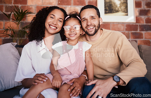 Image of Portrait of family in home, parents and child on sofa with love, bonding and relax in living room. Mom, dad and girl kid on couch in apartment with smile, happy man and woman with daughter together.