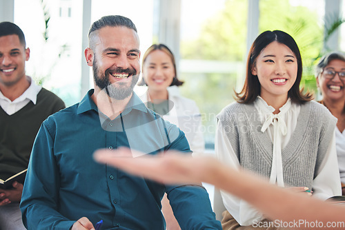 Image of Hand, presentation and happy business people in a meeting in the crowd of a seminar for a mentor. Smile, diversity and team of corporate employees in a work conference and listening to a boss