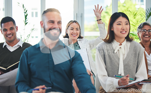 Image of Work seminar, happy and business people with a question, vote or team decision in a conference. Smile, audience and diversity of corporate employees with notes and hand raised during training