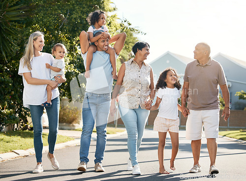 Image of Happy, big family and walking outdoor in neighbourhood street together for fun, bonding or activity with kids, parents and grandparents. Summer, vacation or grandchildren on holiday or adventure